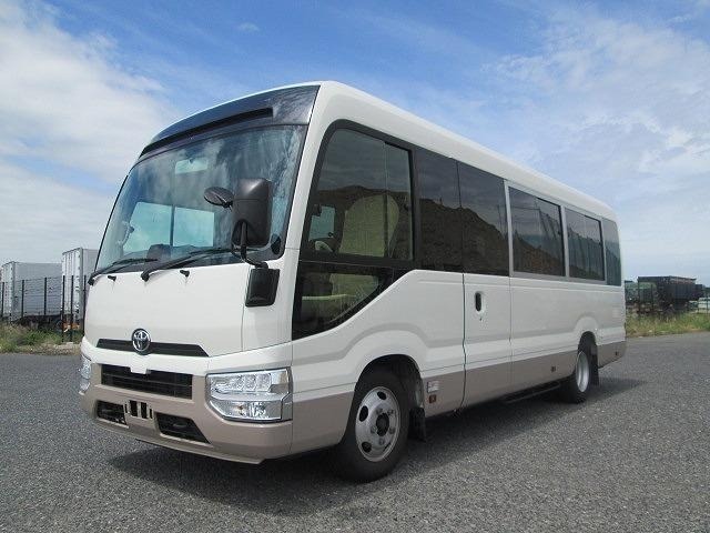 Toyota Coaster White – 2025
